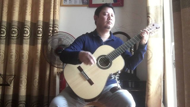 Le Hung Phong (guitar solo) - Ru em từng ngón xuân hồng (ns Trịnh Công Sơn).